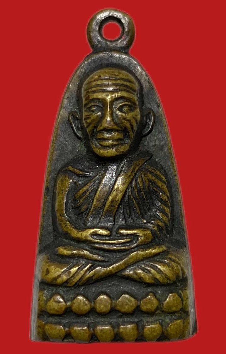 305310 หลวงปู่ทวด วัดช้างให้  เตารีดหลังหนังสือ  ปี2506 พิมพ์มีหู  เนื้อทองเหลืองรมดำ  จ.ปัตตานี