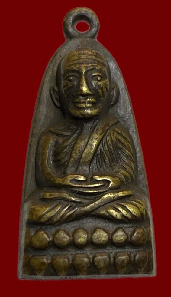 306593 หลวงปู่ทวด วัดช้างให้  เตารีดหลังหนังสือ พิมพ์มีหู ปี 2506  เนื้อทองเหลืองรมดำ จ.ปัตตานี