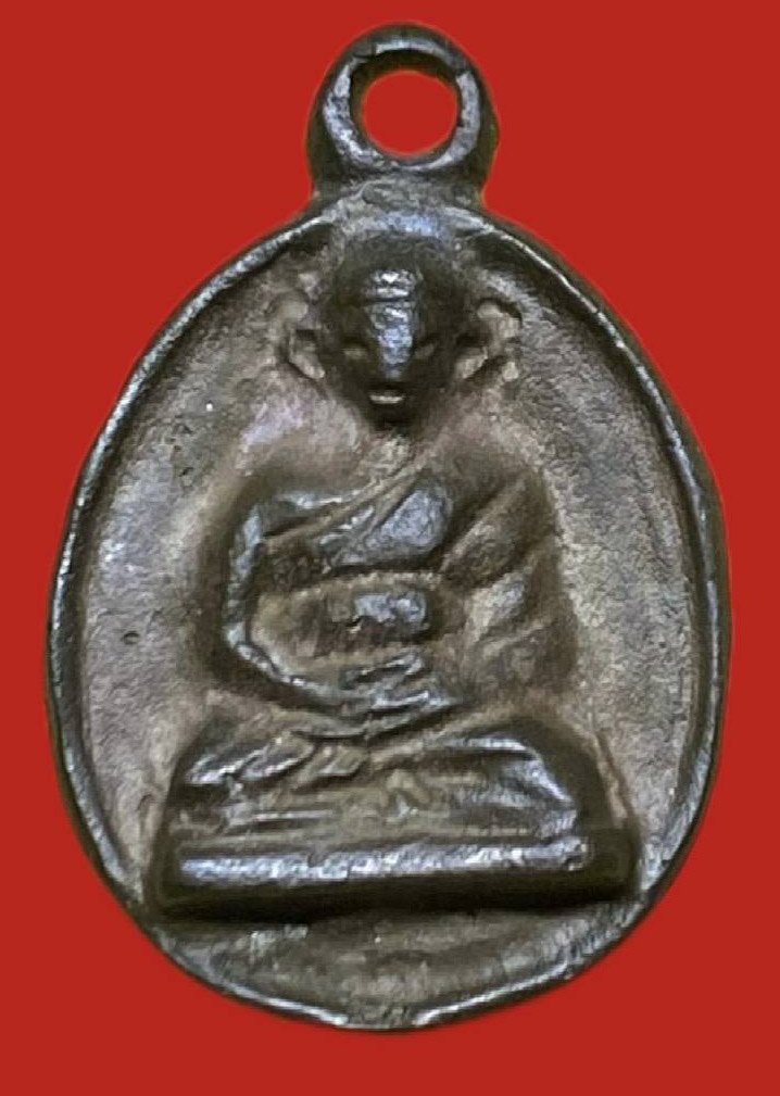 306962 เหรียญหล่อหลวงพ่อไปล่  วัดกำแพง ไข่รุ่น2  สร้างหอพระไตรปิฎก  หลังเจดีย์ เนื้อนวะ  ปี 2539 กทม.