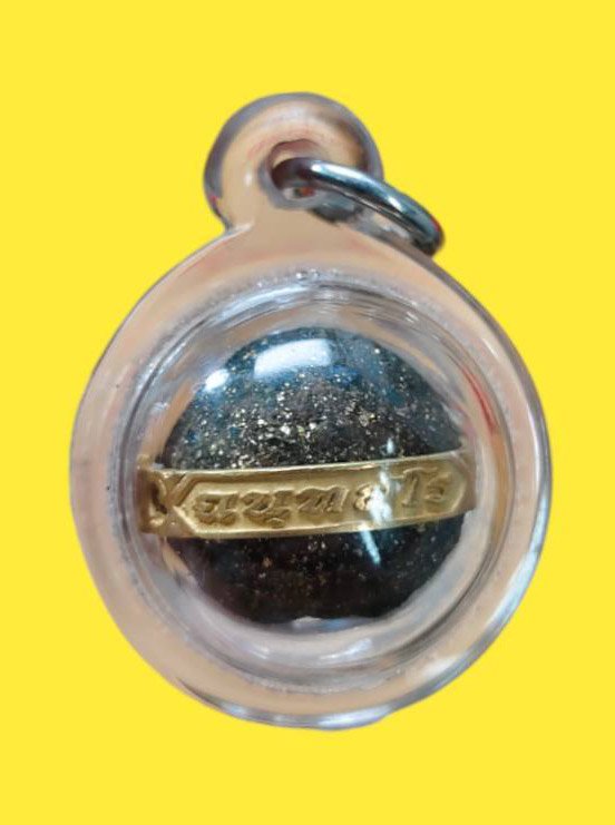 302791 ลูกอมหลวงพ่อไปล่ ปี2557 เนื้อผงทอง วัดกำแพง กรุงเทพมหานคร